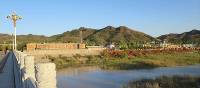 Bridge crossing on in a village on the Great Wall Trek | Ayla Rowe