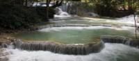 Serene pools at  Khuang Si Waterfall | Kylie Turner