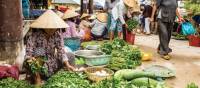 Hustle and bustle at a local market, Vietnam | Richard I'Anson