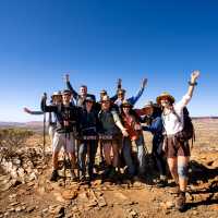 Happy hikers at Euro Ridge on the Larapinta Trail | Shaana McNaught