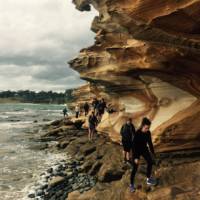 School group exploring the Painted Cliffs on Maria Island | Holly Van De Beek