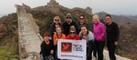 Team photo with the Huma banner on the Great Wall of China | Ayla Rowe
