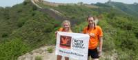 Fundraisers holding the Huma banner on the Great Wall Open Challenge | Claire Smart