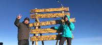 Celebrating on the summit of Mount Kilimanjaro | Georgia Canning