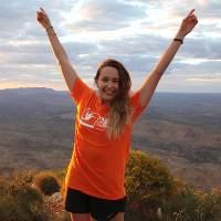 Celebrating at the top of Mount Sonder. |  <i>Larissa Duncombe</i>