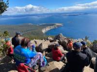 Mater Dei supporters enjoy panoramic views on Day 6 as they Tasmania's East Coast on a Charity Challenge