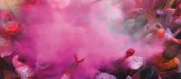 Powders and paints thrown liberally into the air to celebrate Holi Festival | David Lazar