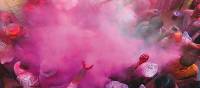 Powders and paints thrown liberally into the air to celebrate Holi Festival | David Lazar