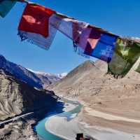 Prayer flags over Zanskar river | Margie Thomas