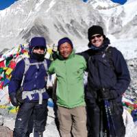 Local guide and trekkers smiling for photo |  <i>Heike Krumm</i>